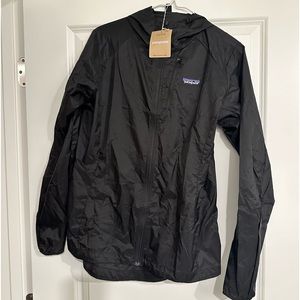 Women’s Patagonia Houdini lightweight hooded jacket.
